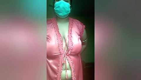An Indian Woman In A Red Gown Showing Off Her Body And Playing With Her Boobs