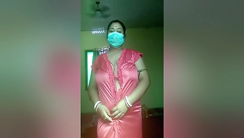 An Indian Woman In A Red Gown Showing Off Her Body And Playing With Her Boobs